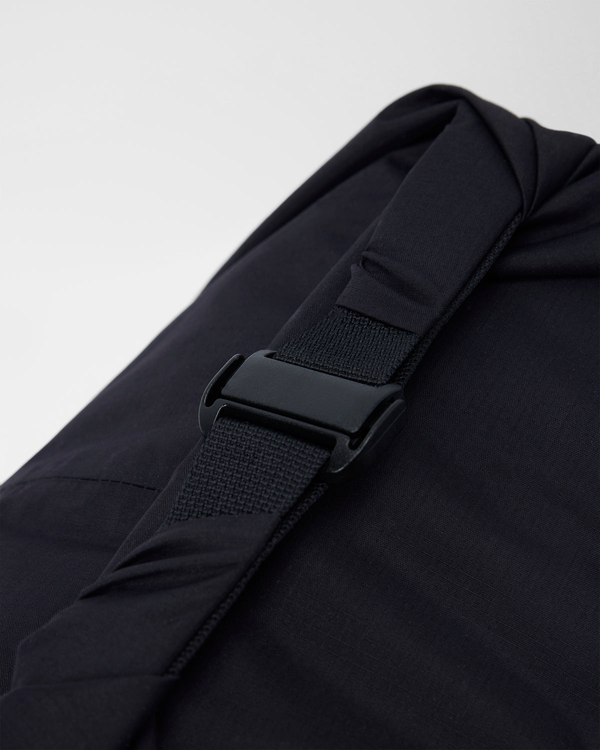 Vuori Packable Travel Bag Lightweight Black Roll Top Bag